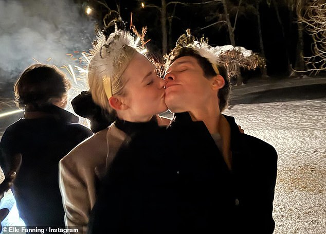 The Maleficent star and her Rolling Stone CEO boyfriend, 34, looked loved-up as she planted kisses on him.