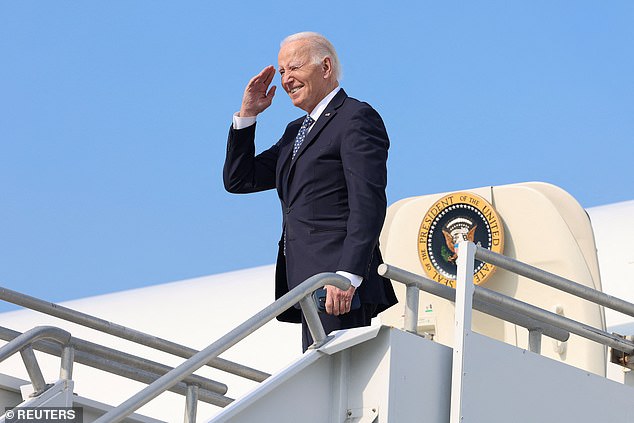 President Joe Biden salutes as he boards Air Force One after his trip to California. His schedule was thrown into disarray due to high winds and subsequent wildfires in the Los Angeles area. He met his new great-grandchild before leaving for Washington, DC