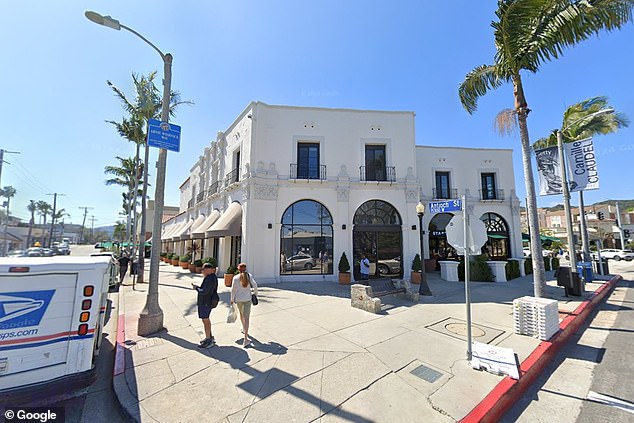 The same building appears in the photo before being destroyed by the flames that devastated the luxurious enclave.