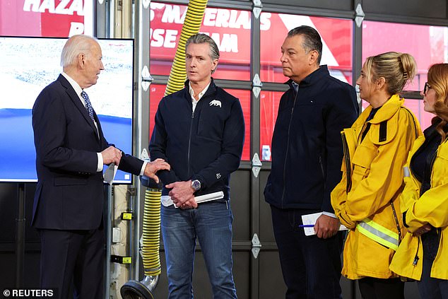 US President Joe Biden speaks with California Governor Gavin Newsom as he visits a Santa Monica fire station to receive a briefing from Cal Fire officials on the Palisades wildfire, in Santa Monica on Wednesday .