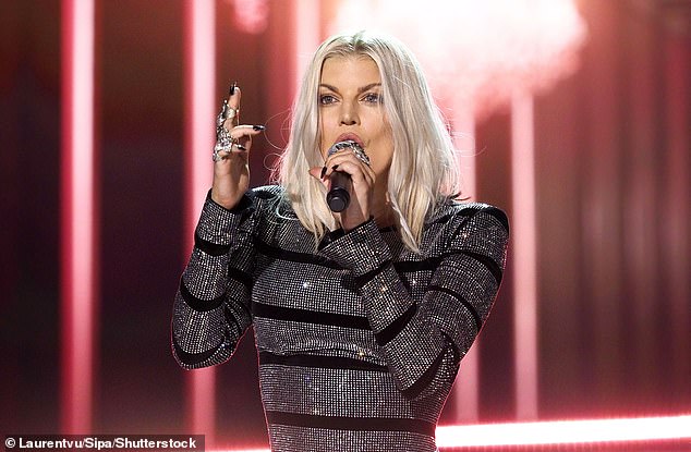 Massive flames can be seen licking a hillside neighboring Fergie's home in the upscale Brentwood neighborhood of Los Angeles; in the photo 2017