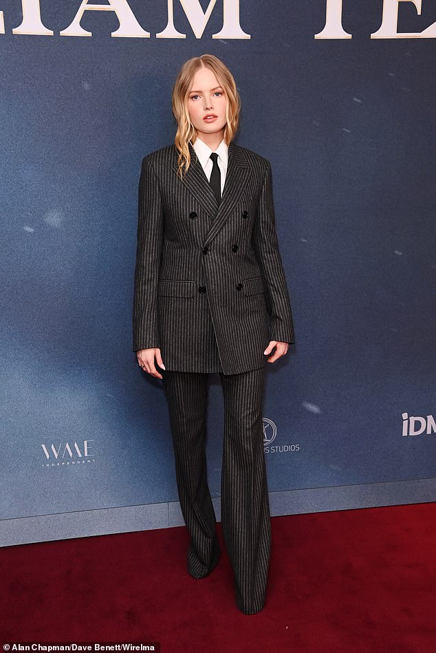 The actress, 27, who plays Princess Bertha in the historical drama, wore an elegant black striped suit consisting of a double-breasted jacket and tailored flared trousers.