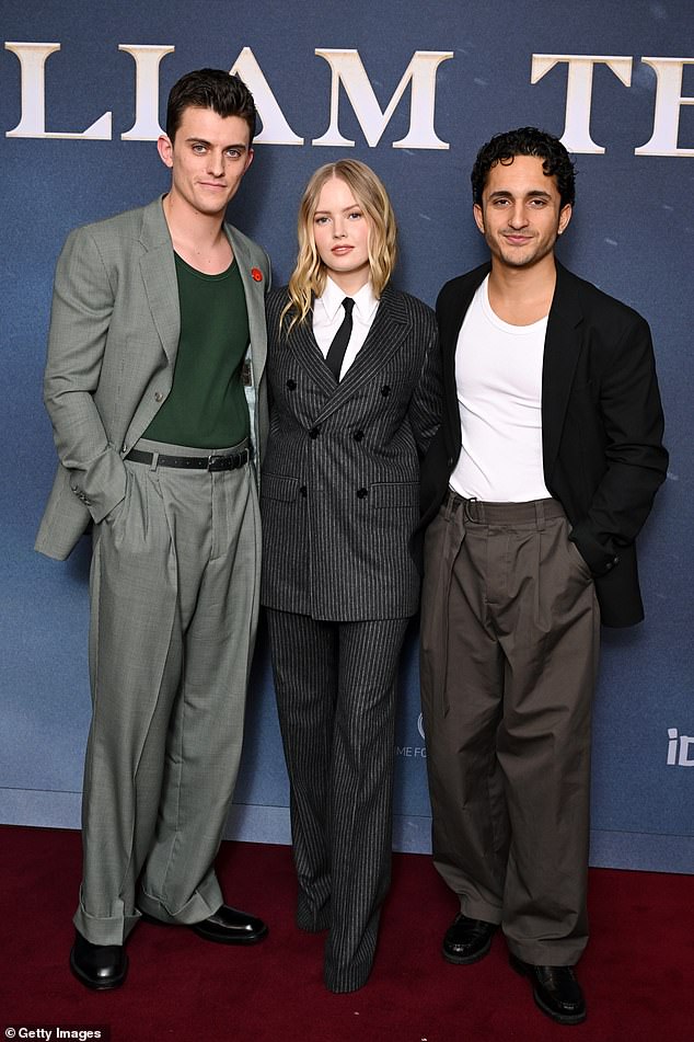 Jake Dunn (left) and Tobias Jowett (right) also joined Ellie on the red carpet. The couple cut elegant and casual figures while posing for several photographs.