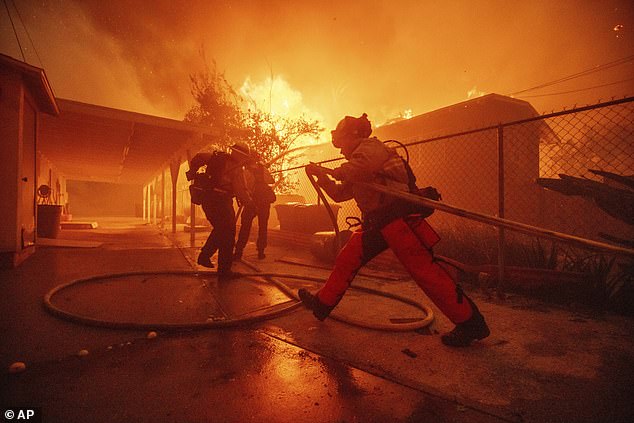 Firefighters protect structure as Eaton Fire rages