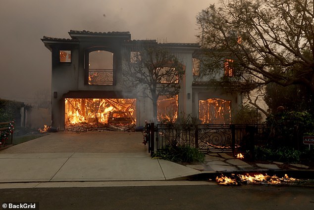 Across the street, his neighbor's mansion was covered in smoke and flames, and the entire back half of the mansion now seemed nonexistent.