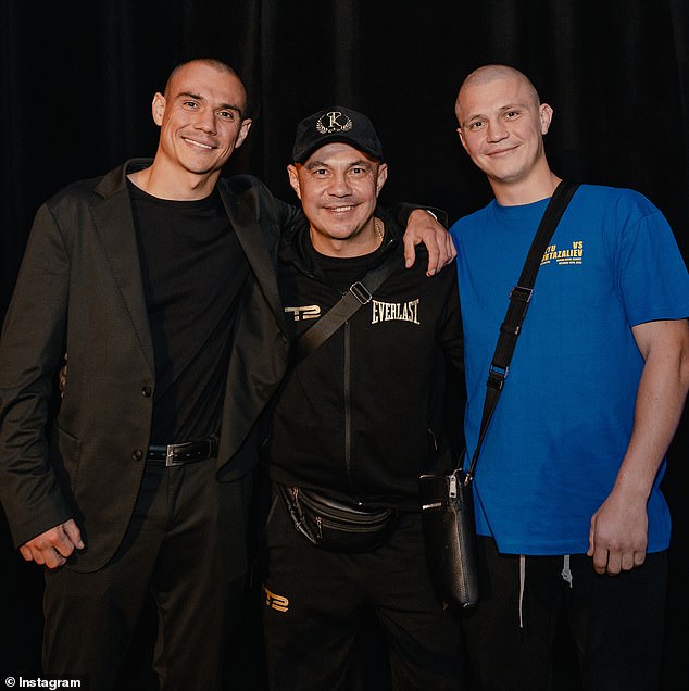 Only a few people attended the ceremony, including Nikita's brother Tim (left) and her father Kostya (center, pictured with Nikita).