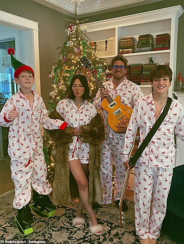 Lindsay and Curtis are pictured with their sons Emerson and Hudson, 14, at their home over Christmas, just weeks before deadly fires hit the Palisades.