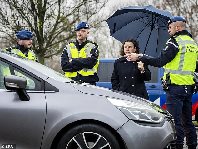 The Minister of Asylum and Migration of the Netherlands, Marjolein Faber (center), at the start of border controls in Eijsden, Netherlands.