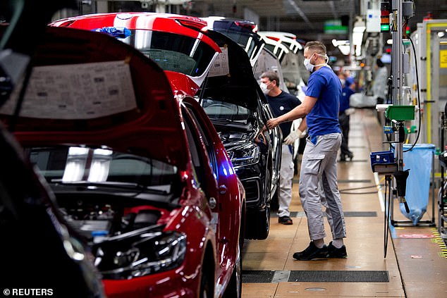 A worker on the Volkswagen assembly line in Wolfsburg, Germany. It is the employers who paid the price for the large number of absences, which cost them a whopping 77 billion salaries.