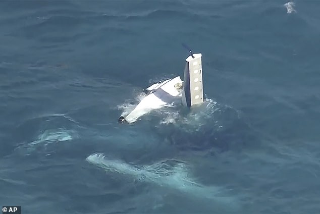 The ATSB has begun recovery and examination of wreckage from the crash site and it will take time for the bureau to determine what may have caused the crash (pictured, the floatplane submerged in the water in Thompson Bay).