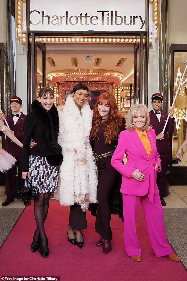 The model, 34, wore a figure-hugging dress and fur coat to the event to celebrate the opening of Charlotte's iconic Beauty Wonderland in Covent Garden.