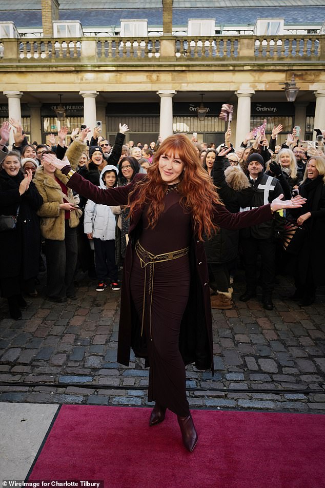 Hundreds of her fans posed with her in Covent Garden