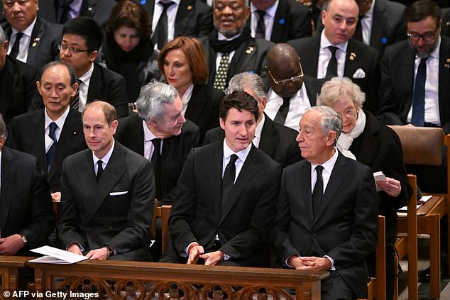 Prince Edward of the United Kingdom (left) and Canadian Prime Minister Justin Trudeau (center) attend Carter's funeral