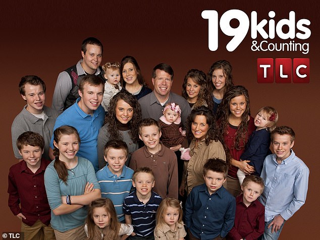 The Duggar family with parents Jim Bob Duggar and Michelle, are shown in a promotional image for the canceled TLC show 19 Kids And Counting.