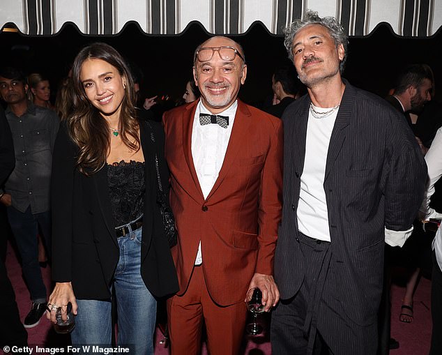 She also posed for photos with shoe designer Christian Louboutin and director Taika Waititi.