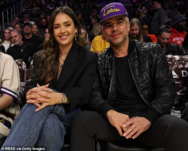 The Into The Blue star seen with her husband Cash at the Toronto Raptors vs Lakers game in November in Los Angeles.