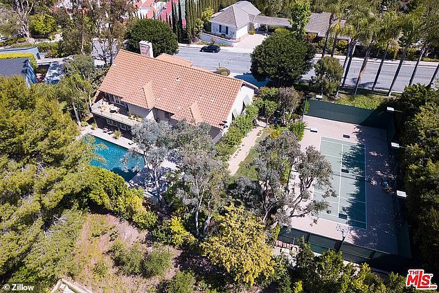 The 436-square-foot home was two stories with five bedrooms, five bathrooms and was originally built in the 1980s.