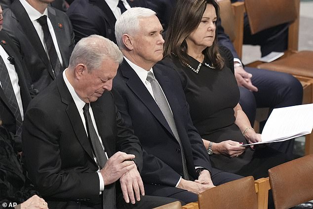 Former Vice Presidents Al Gore (left) and Mike Pence (center) sit stone-faced next to former second lady Karen Pence. Karen Pence refused to acknowledge the Trumps at Carter's funeral on Thursday