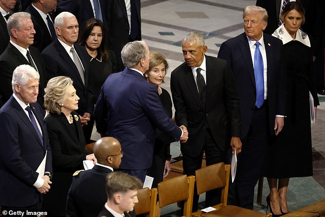 When former President George W. Bush arrived, he playfully punched former President Barack Obama in the stomach and appeared to ignore the Trumps. He was later photographed shaking hands with Trump