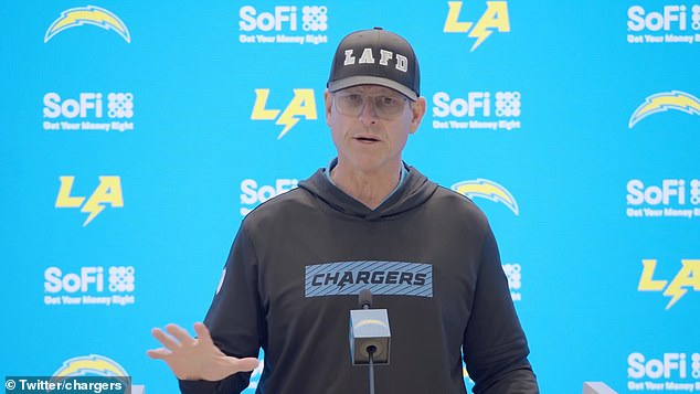 Jim Harbaugh spoke to the media Thursday while wearing an LAFD baseball hat