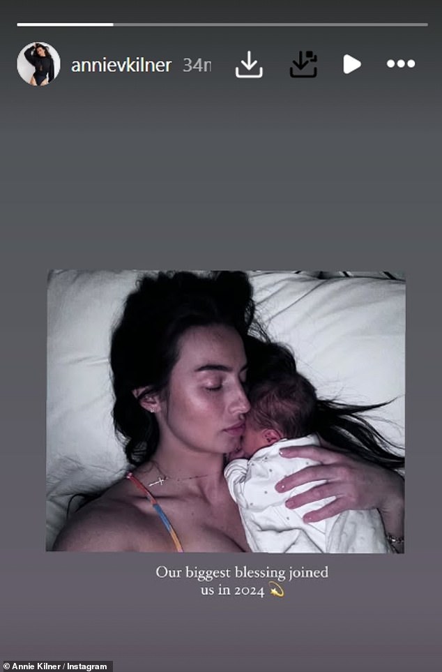 Just hours later, Annie shared her 'biggest blessing' on Instagram as she looked back on 2024 and uploaded a sweet photo from earlier this year while cradling her newborn baby Rezon.