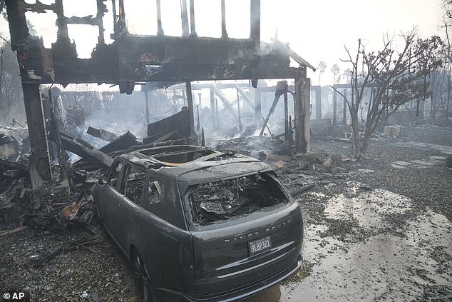 A building is burned by the Palisades Fire in the Pacific Palisades neighborhood of Los Angeles