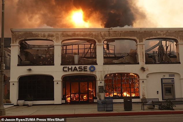 A fire engulfs Chase bank. Firefighters continued to battle the intense blaze in Pacific Palisades