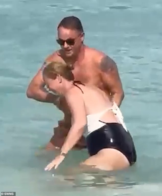 Footage of the couple, taken by another hotel guest, showed them struggling to get to their feet as waves crashed against them.