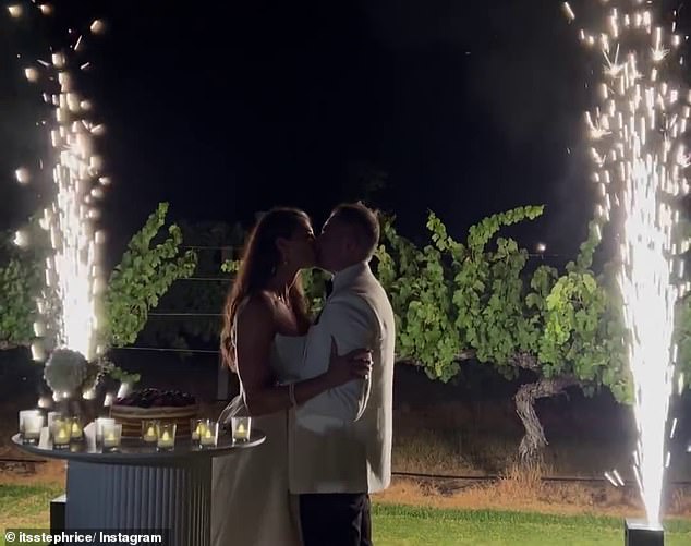 Later that night, the couple kissed as sparklers lit up the sky behind them as they looked happier than ever after saying 