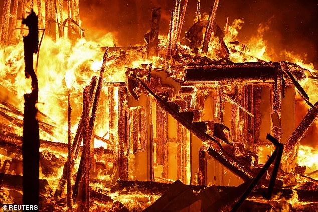 So far, the devastating fires have killed seven people and leveled thousands of homes (pictured: flames engulf a home in Pasadena, north of Los Angeles).