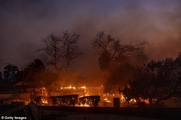 Many A-list celebrities have lost their stunning multi-million dollar mansions in Los Angeles due to a series of devastating fires; A house seen burning in Altadena