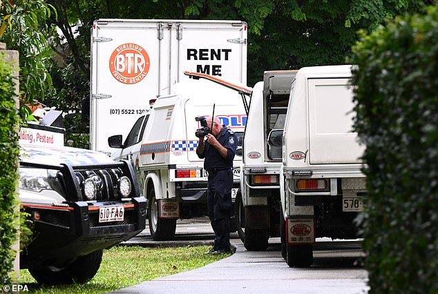 Police are pictured at the scene of the shooting on the Gold Coast on Thursday.