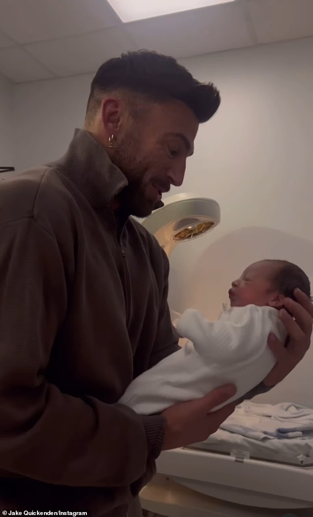 The delighted father couldn't take his eyes off his youngest son in the beautiful video