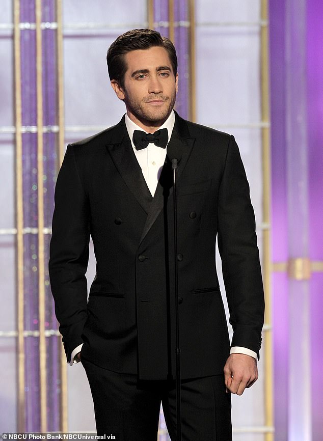 Jake Gyllenhaal on stage during the 69th Annual Golden Globe Awards held at the Beverly Hilton Hotel on January 15, 2012 wearing a tuxedo.