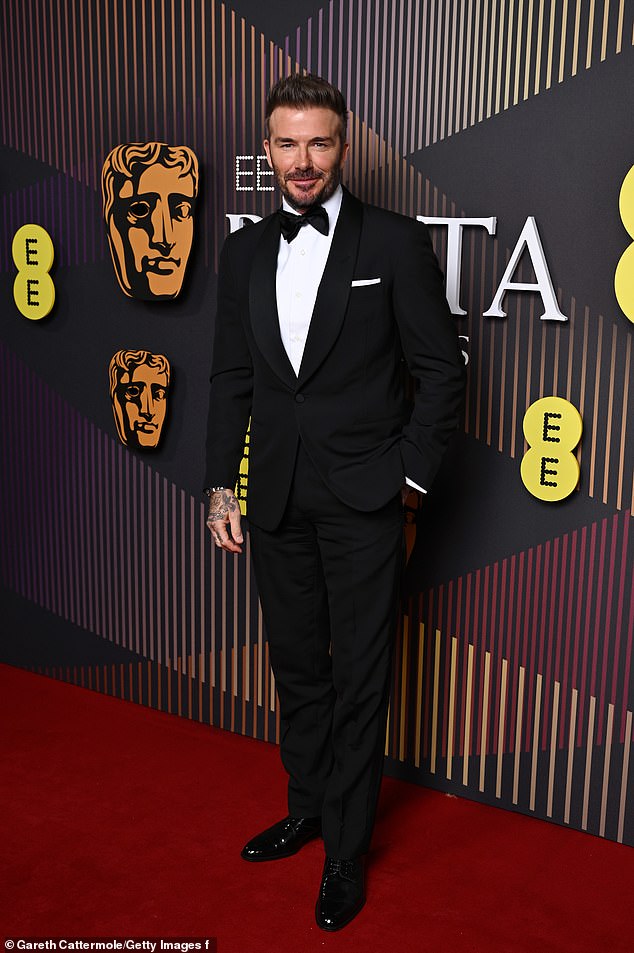 David Beckham attends the EE BAFTA Film Awards 2024 at the Royal Festival Hall on February 18 wearing a tuxedo