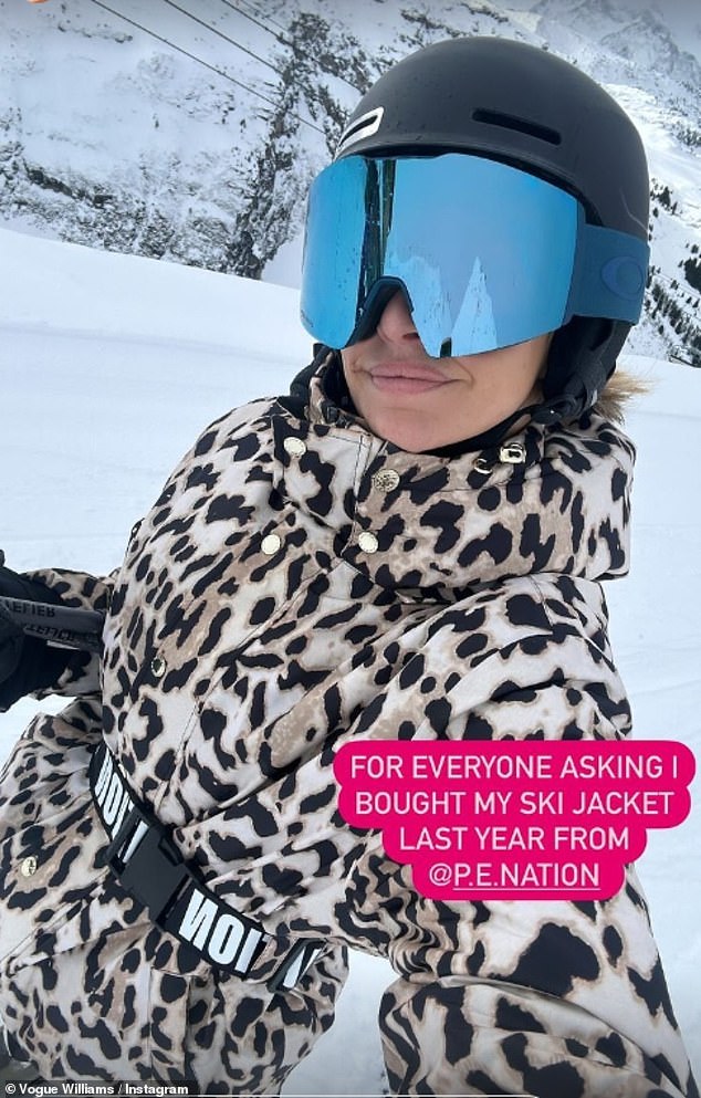 Vogue, 39, looked chic while wearing a leopard-print coat and blue glasses.