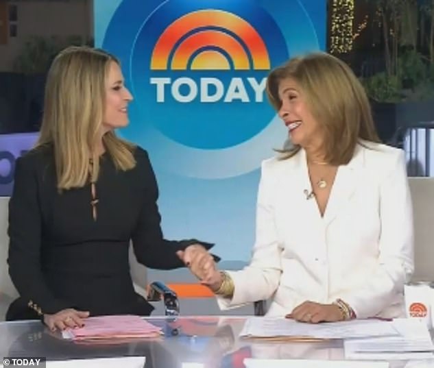 The anchor, 60, held Savannah Guthrie's hand as they began their latest news update