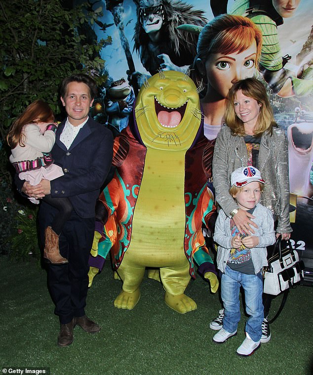 Briton Mark made his move to America permanent after selling his sprawling Hampshire home for £6.5 million in August 2021 (pictured with his wife and two of his children in 2013).