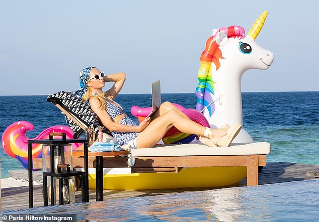 Paris Hilton relaxes by the ocean on a trip to the Maldives