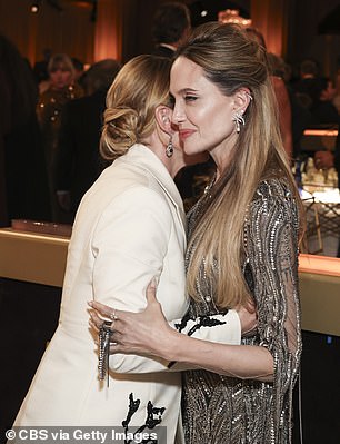 She also got cozy with Kate Winslet at the event