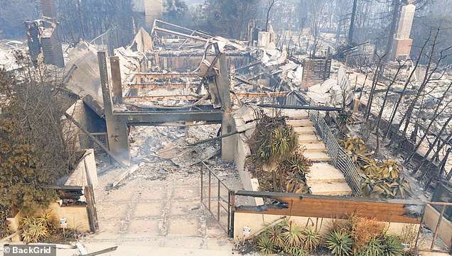 Photos reveal the charred remains of the classic colonial home, with little more than a charred fence as the only trace of what was once a beautiful property.