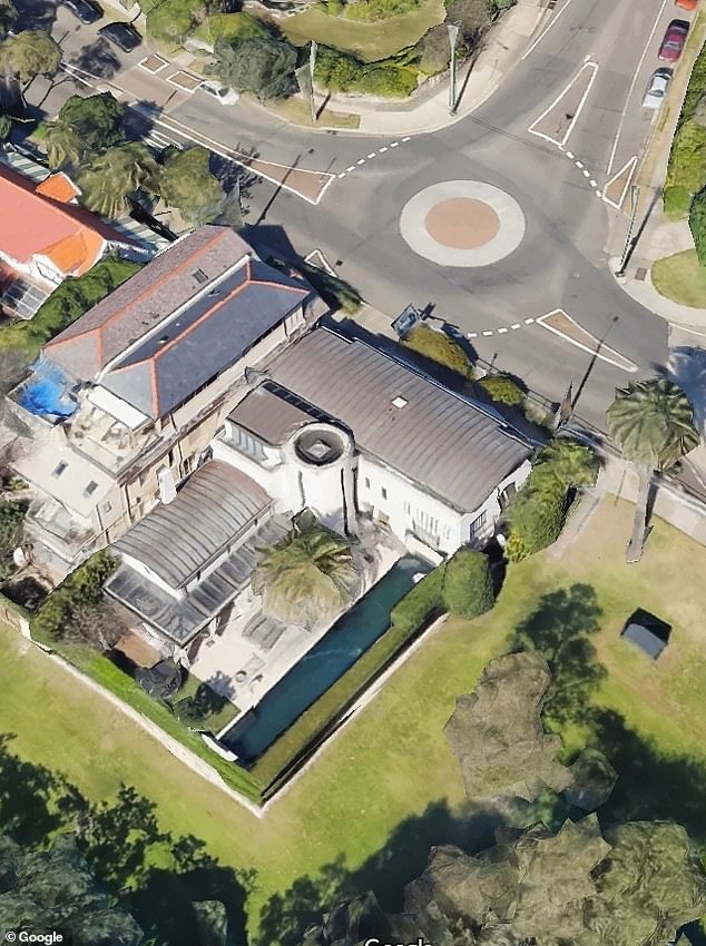 The $500,000 supercar crashed into the wall of a harborside mansion on a roundabout in Watsons Bay.