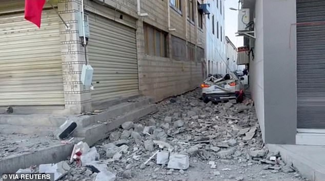 A car is crushed by falling debris in Tibet