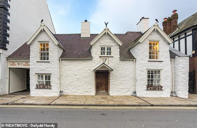 From the outside, the four-bedroom house, located in Conwy, looks like a quaint, unremarkable period property.