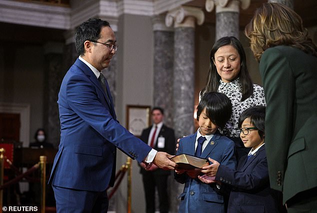 Newly elected Senator Andy Kim of New Jersey shares a moment with his children and the vice president on January 3