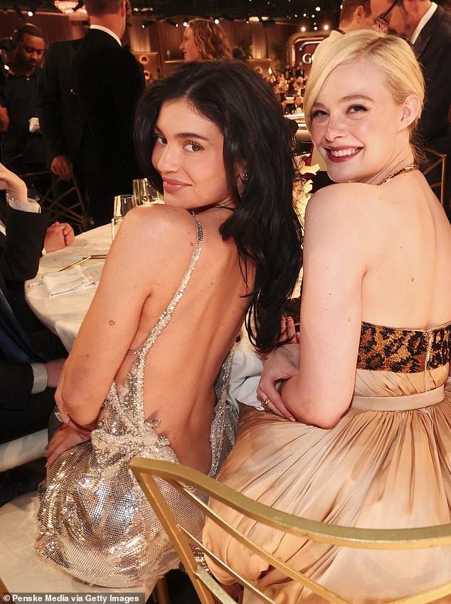 The wardrobe malfunction was easy to spot when Kylie took photos with star Elle Fanning.