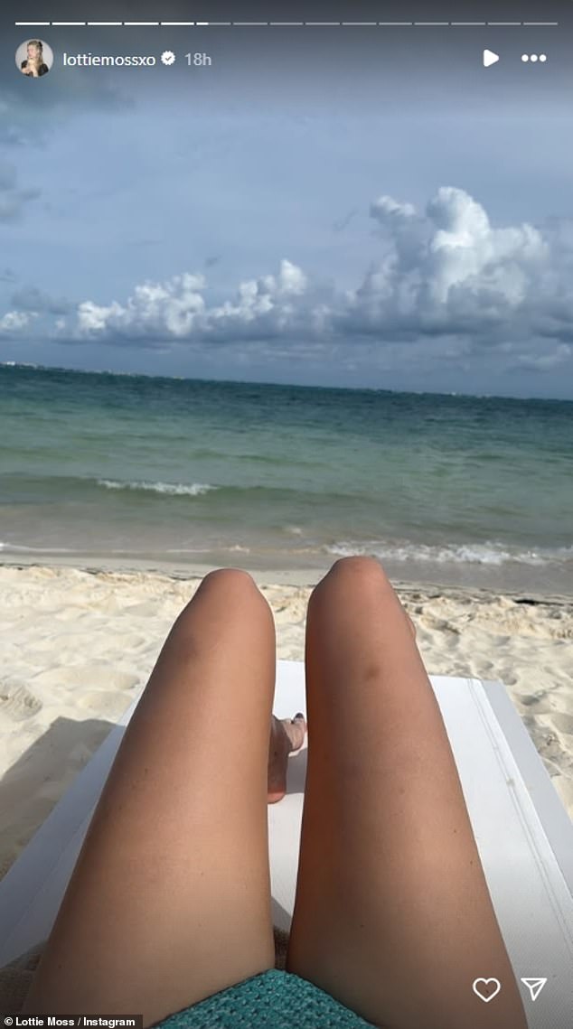 Lottie also shared a photo of herself sunbathing on the beach.