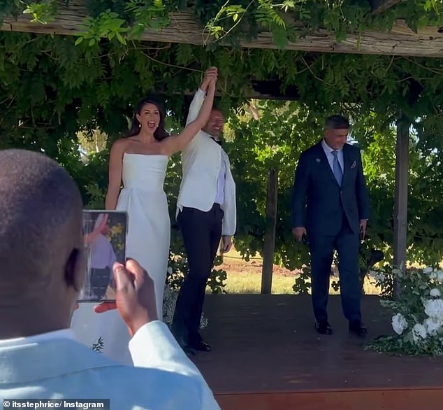 The couple exchanged vows in a picture-perfect ceremony held in a vineyard and shared a video documenting the moment they were declared married (pictured).