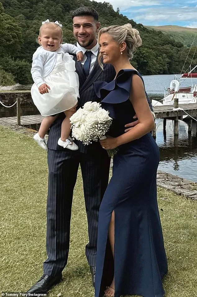 The former couple with their 19-month-old daughter Bambi at a wedding this year.