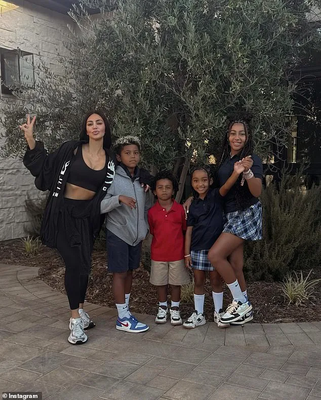 This sighting comes after Kim was spotted posing with the four children she shares with West as they headed to school. 